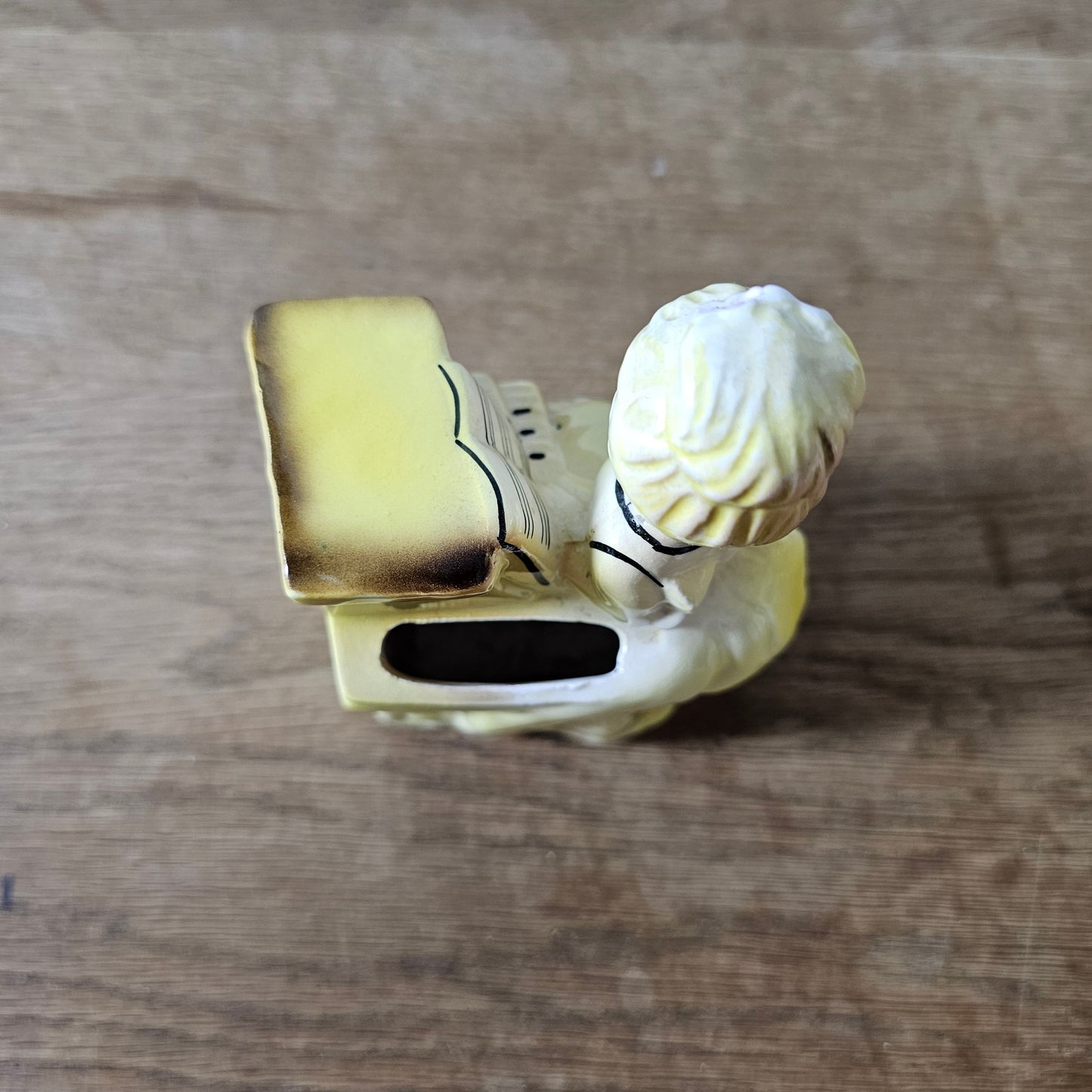 1950s girl in yellow dress playing piano ceramic bud vase figurine