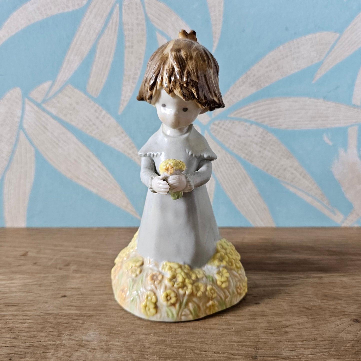 1988 Enesco Kinka girl holding flowers ceramic figurine