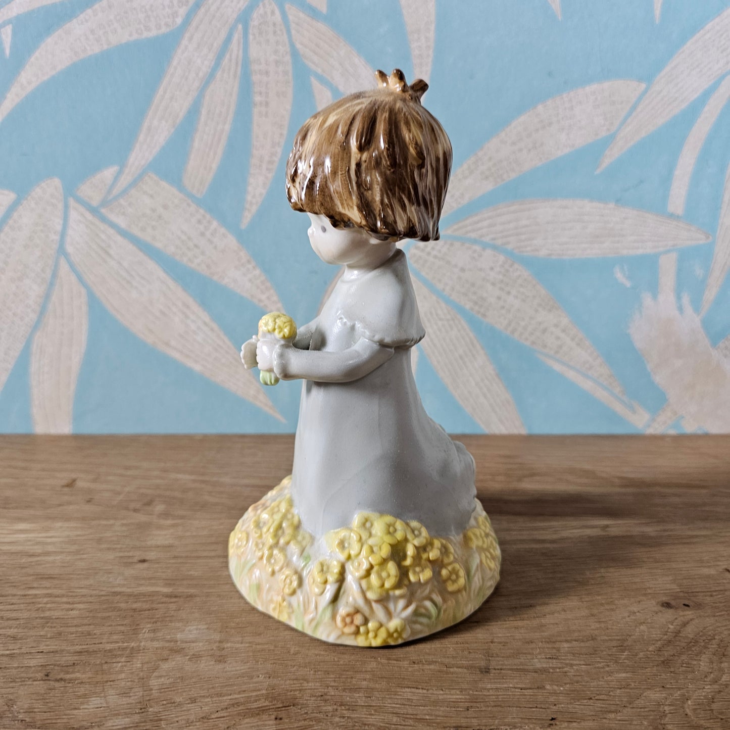 1988 Enesco Kinka girl holding flowers ceramic figurine