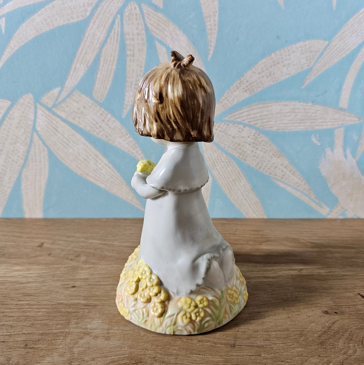 1988 Enesco Kinka girl holding flowers ceramic figurine