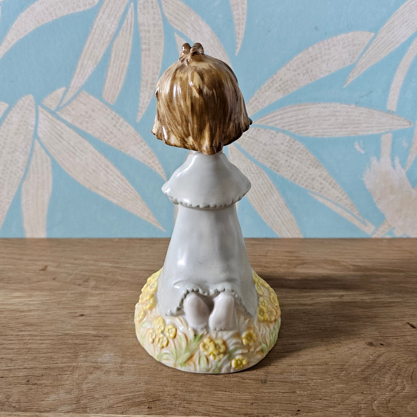 1988 Enesco Kinka girl holding flowers ceramic figurine