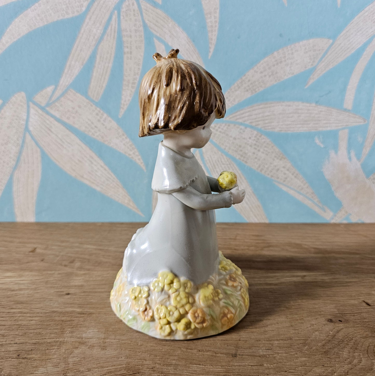 1988 Enesco Kinka girl holding flowers ceramic figurine