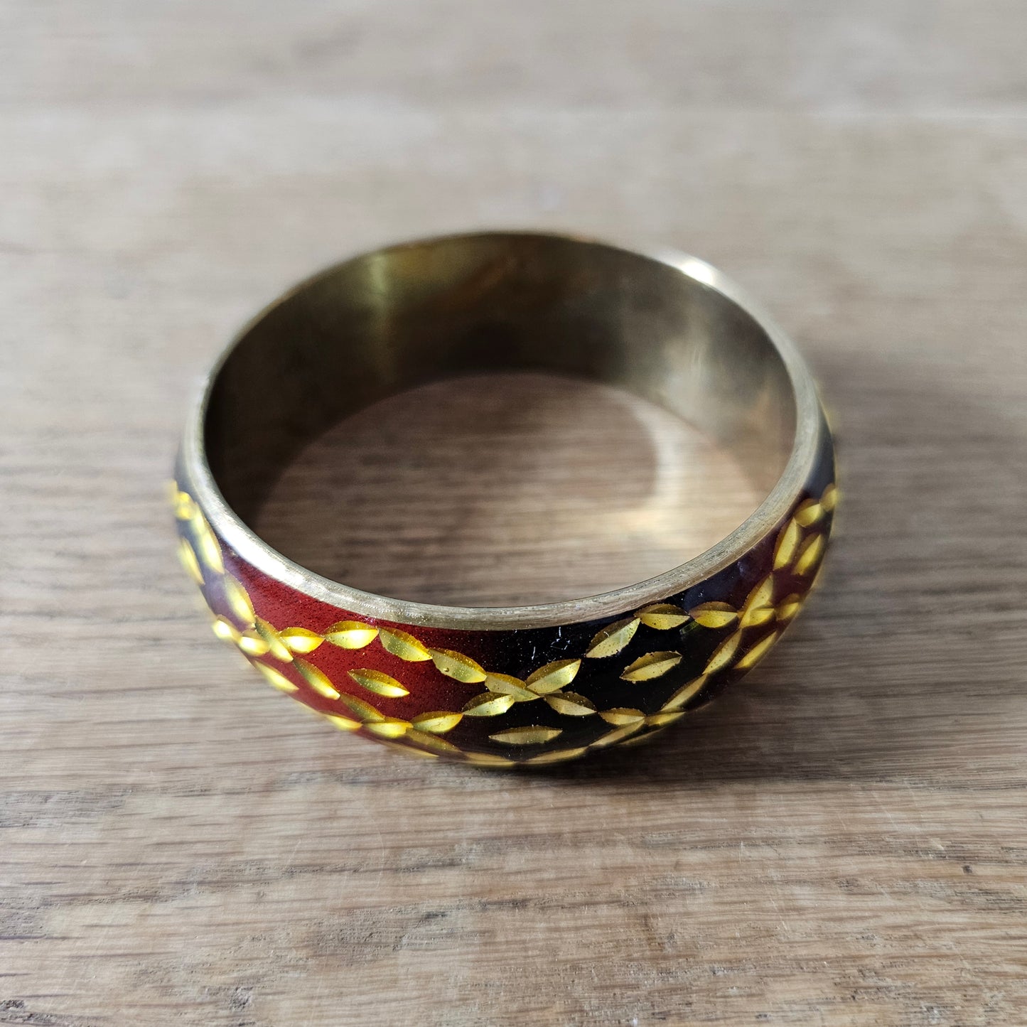 1980s burgundy black & gold leaf-effect resin domed bangle