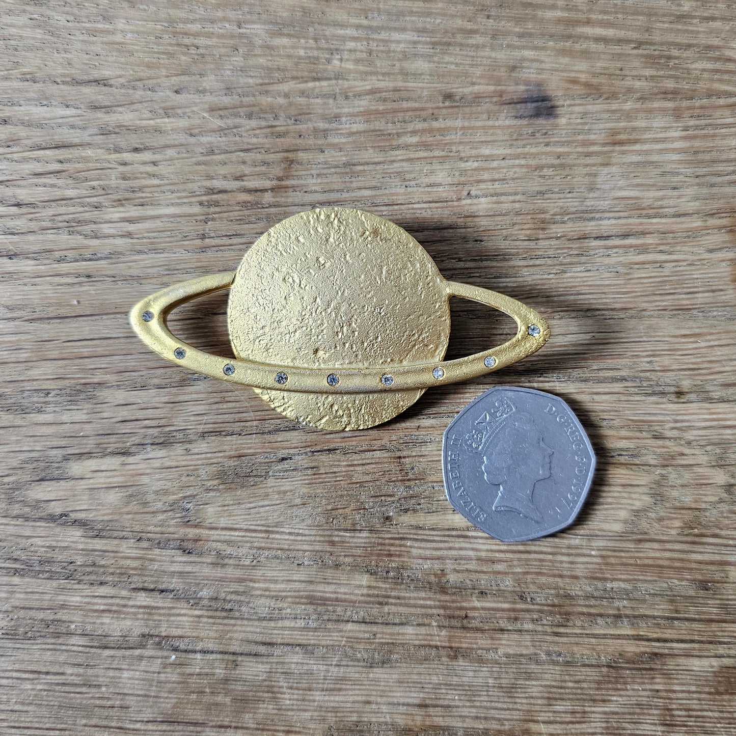 1960s/70s Kida E288 gold-tone rhinestone Saturn planet brooch