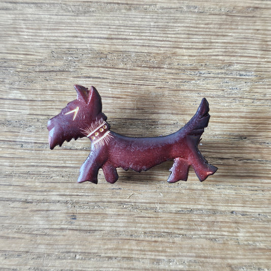 1930s/40s burgundy resin elongated Scottie dog brooch