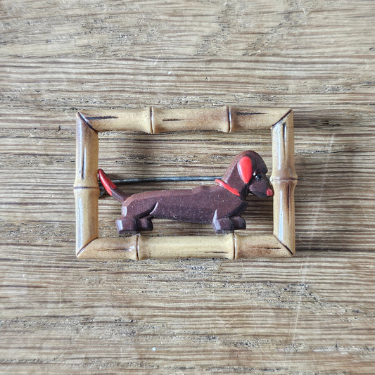 1930s/40s acrylic Dachshund dog in faux bamboo frame brooch