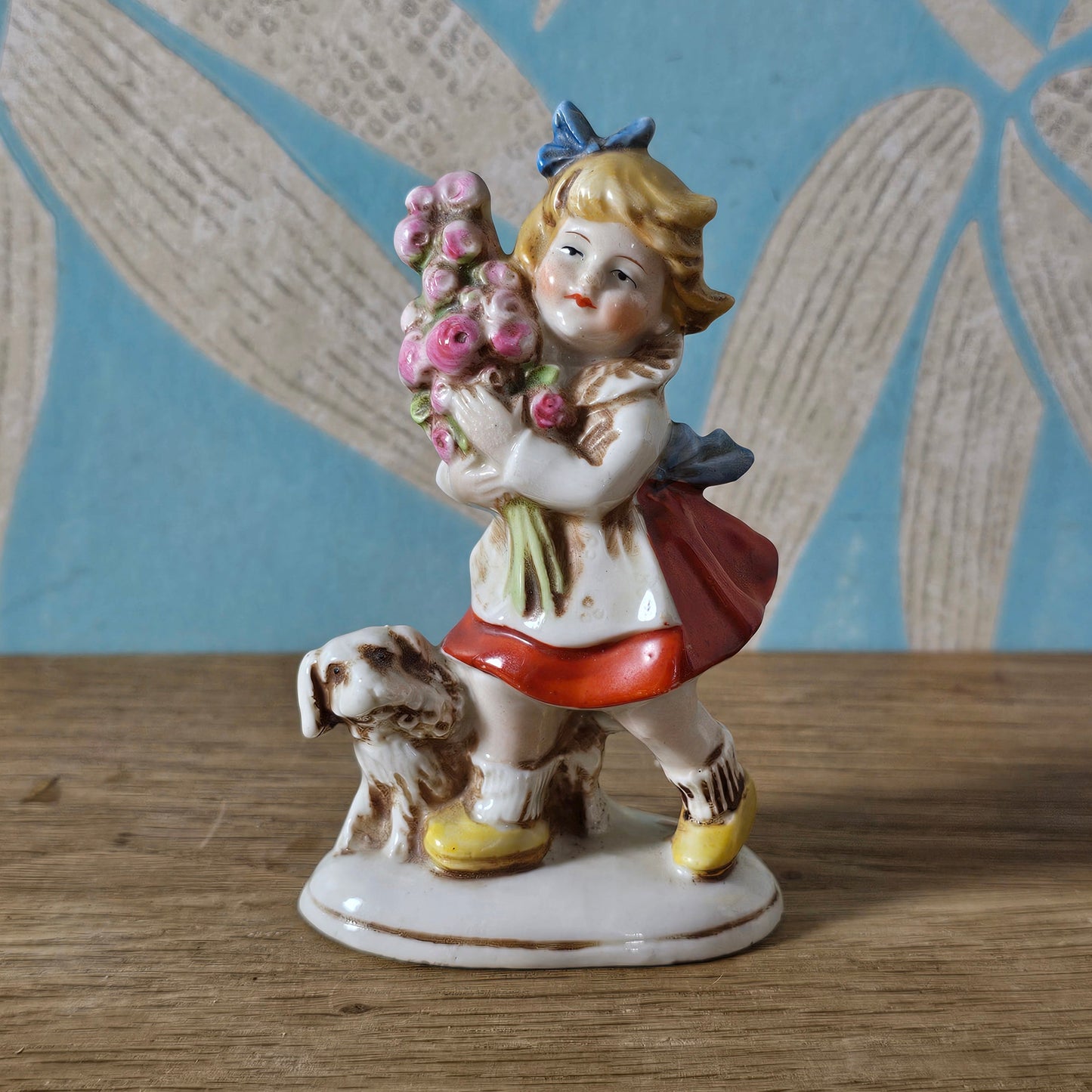 1950s German ceramic girl figurine with flowers and dog