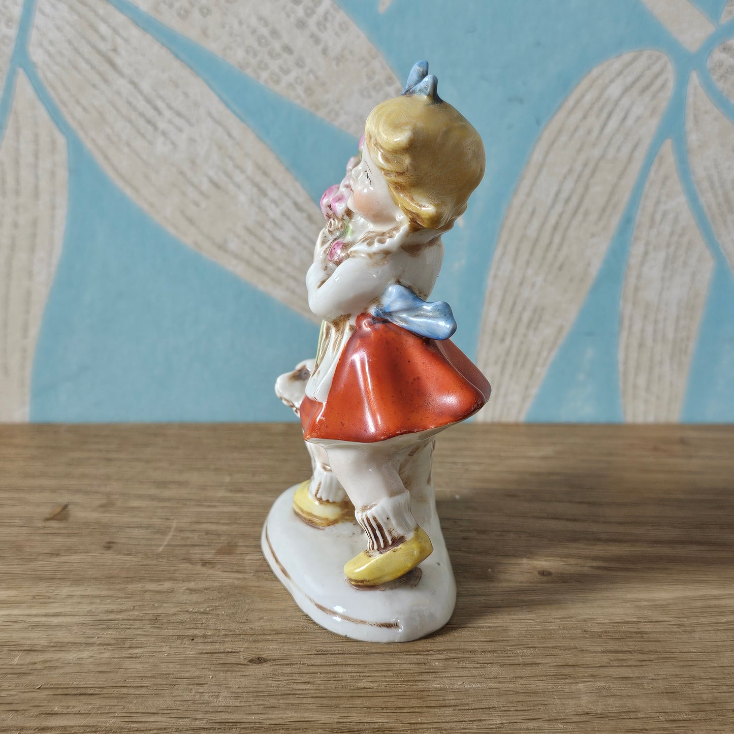 1950s German ceramic girl figurine with flowers and dog