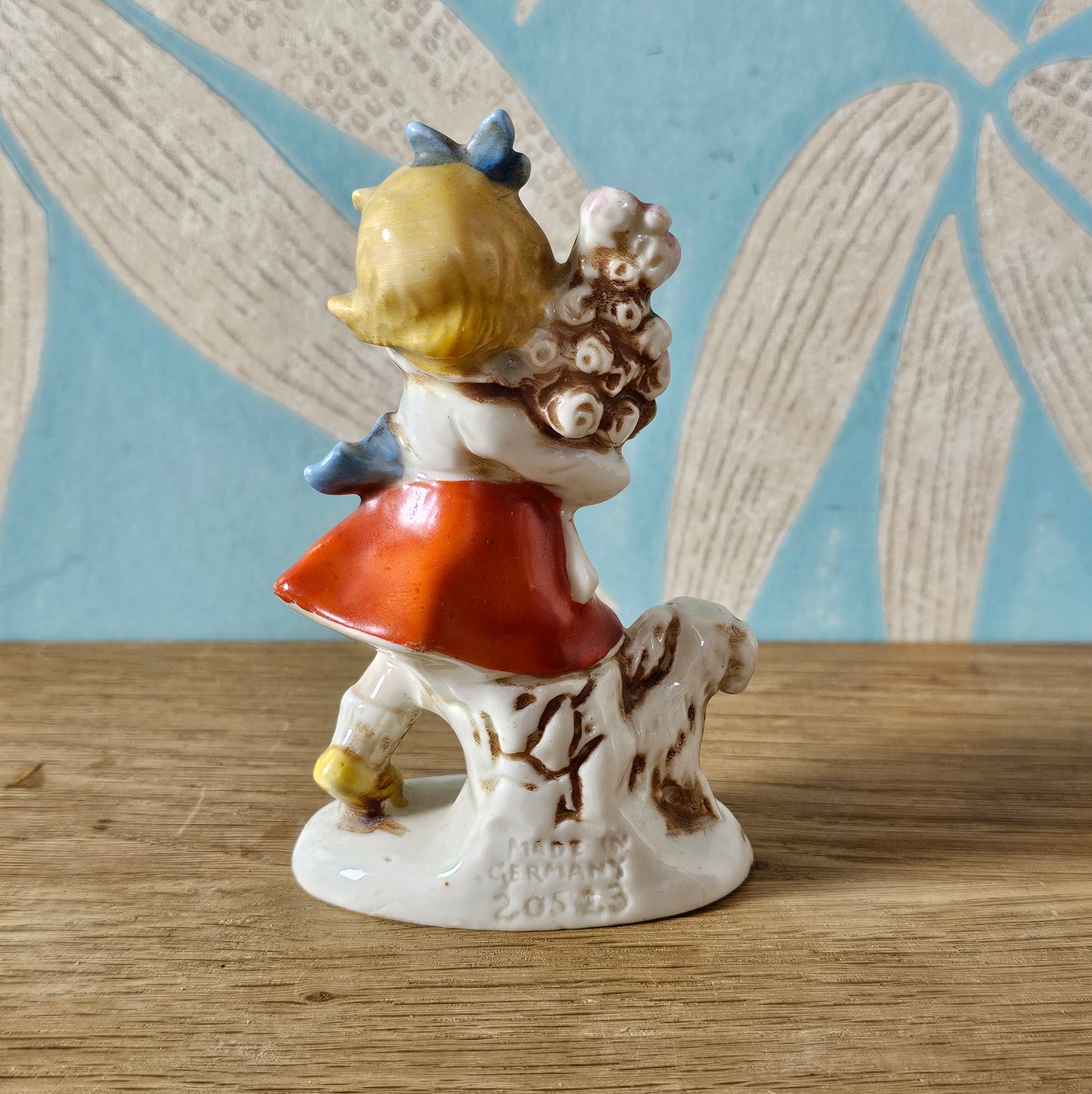 1950s German ceramic girl figurine with flowers and dog