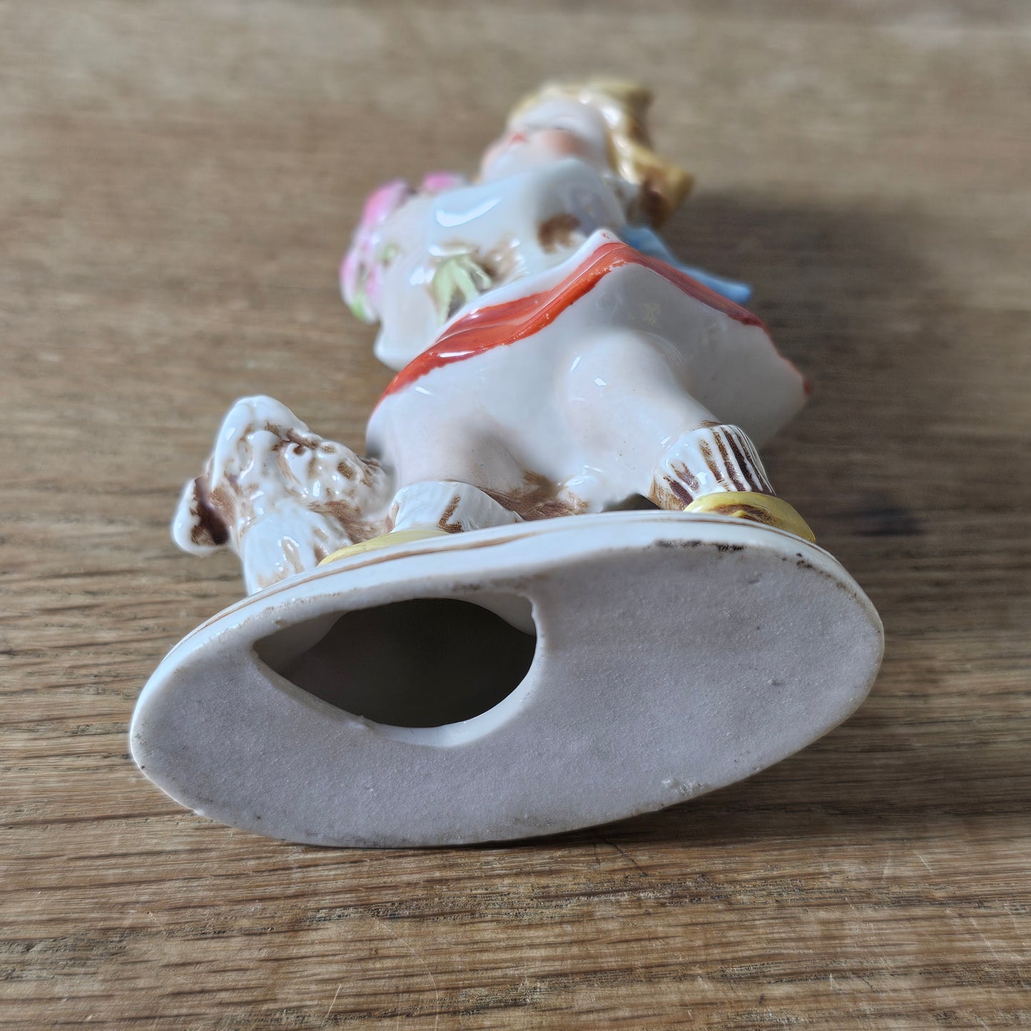 1950s German ceramic girl figurine with flowers and dog