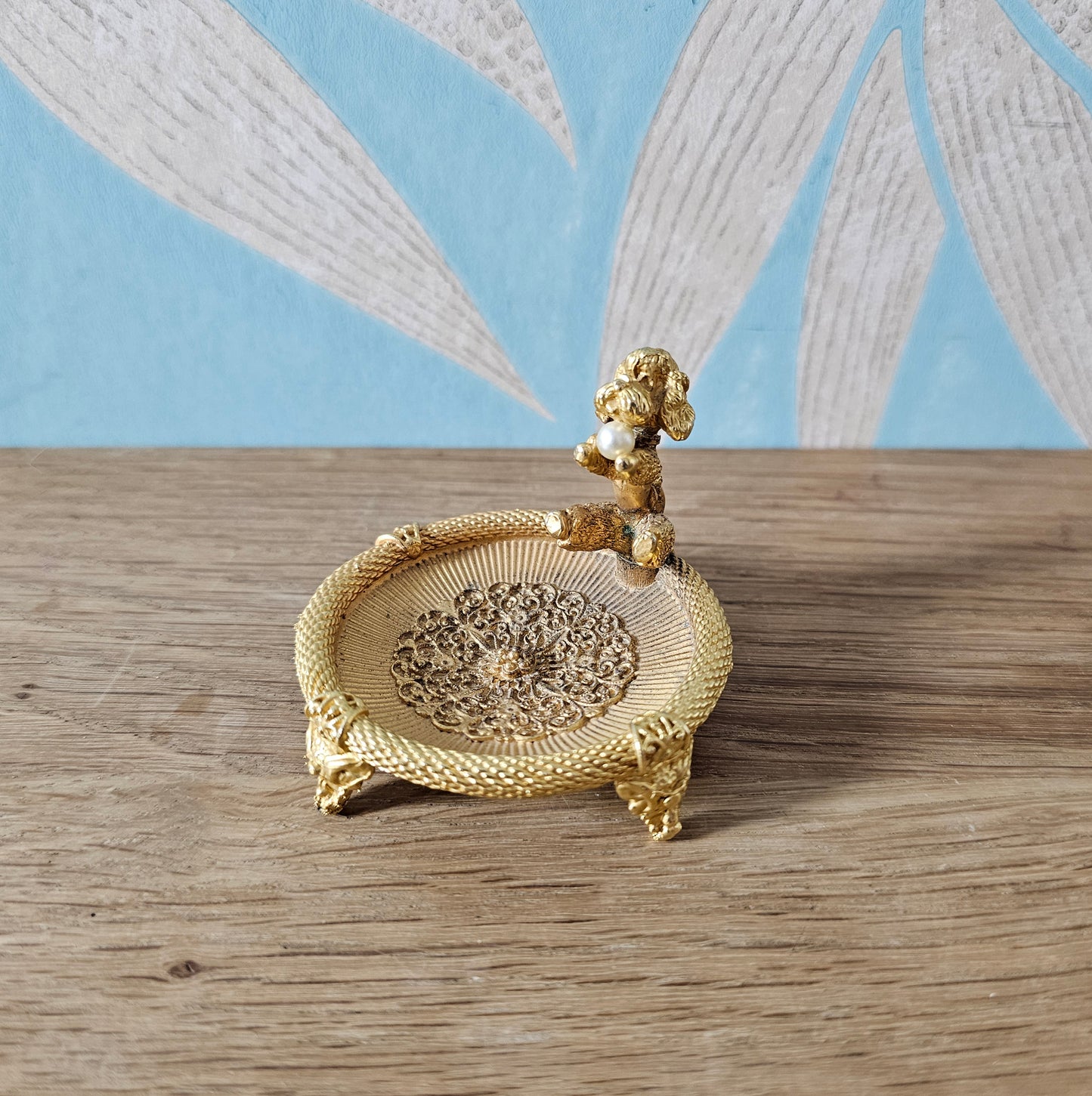 1950s Mirabella gold-tone poodle ring dish with faux pearl detail