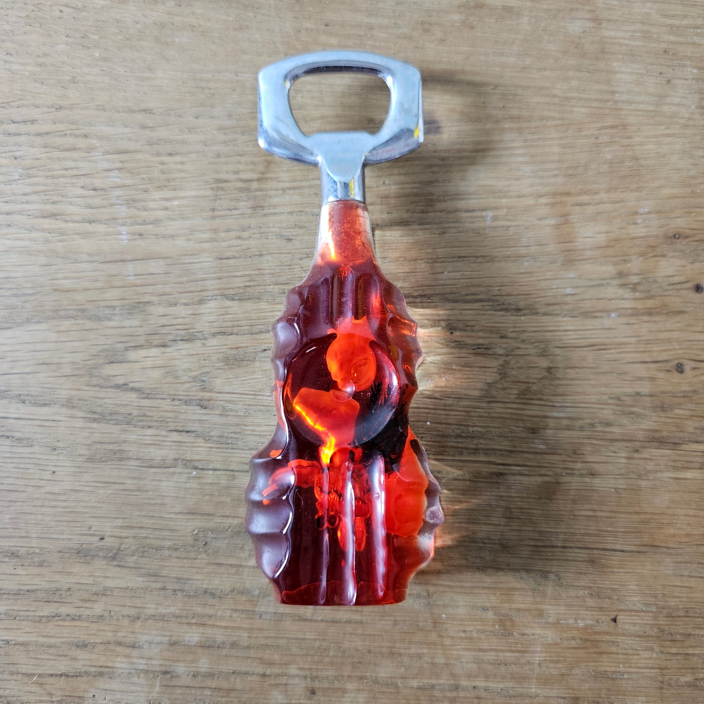1950s red lucite seaside souvenir bottle opener with embedded shells