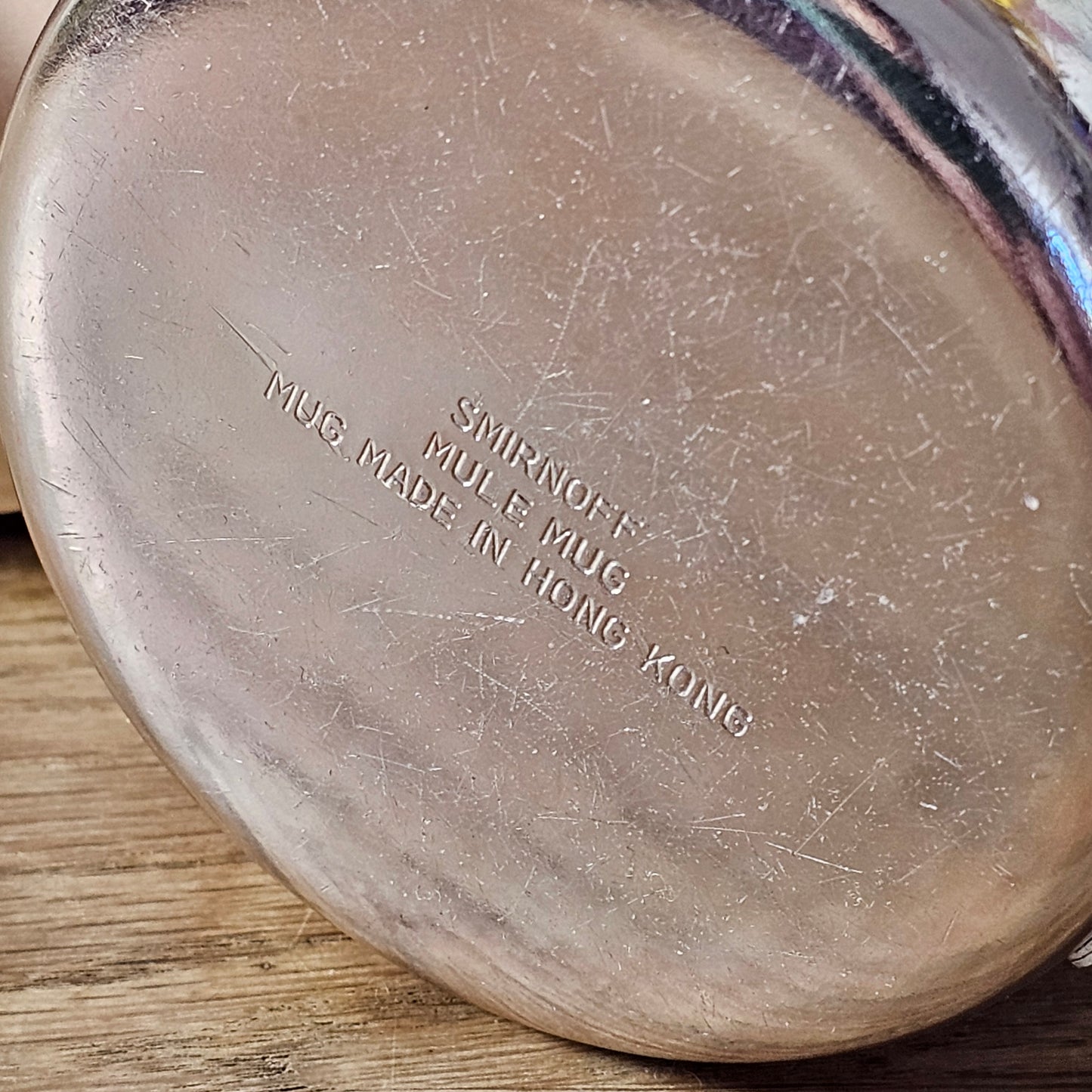 Pair of vintage Smirnoff rose-gold & copper mule mugs