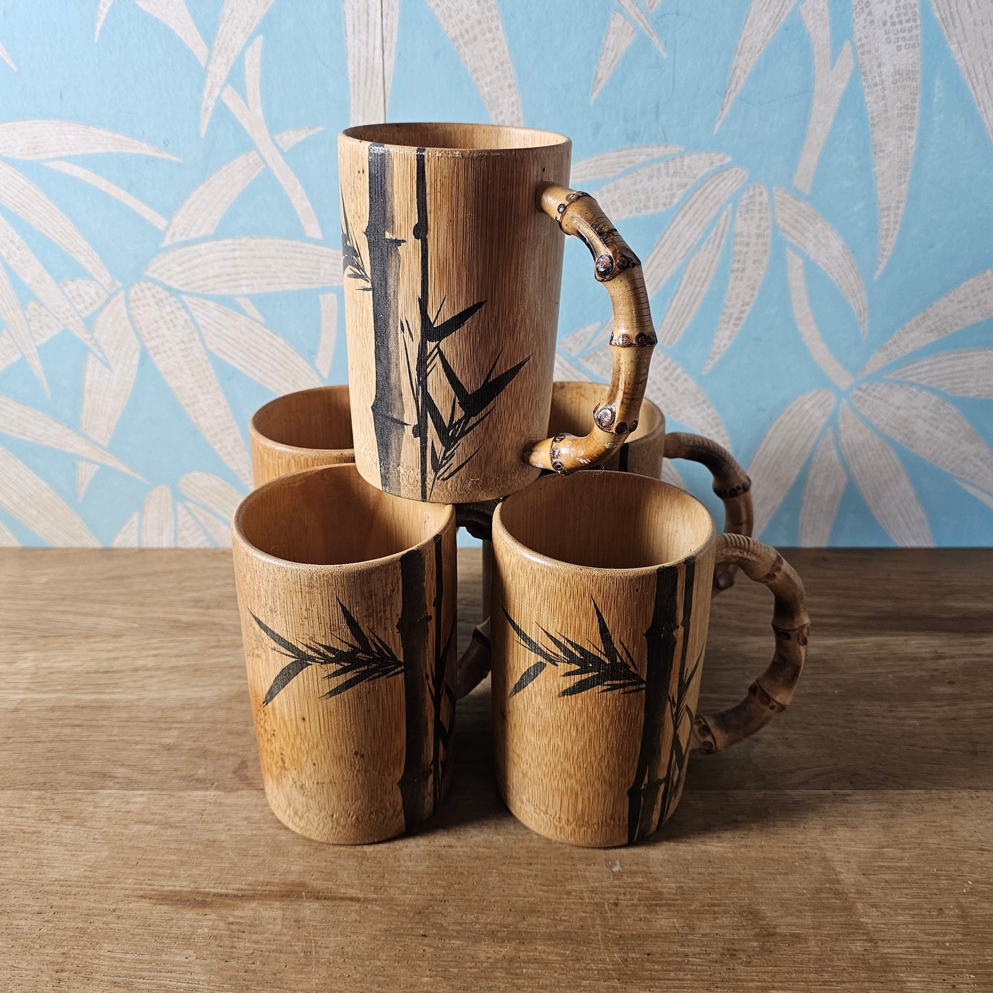 Set of five 1970s hand-painted bamboo wood tankards
