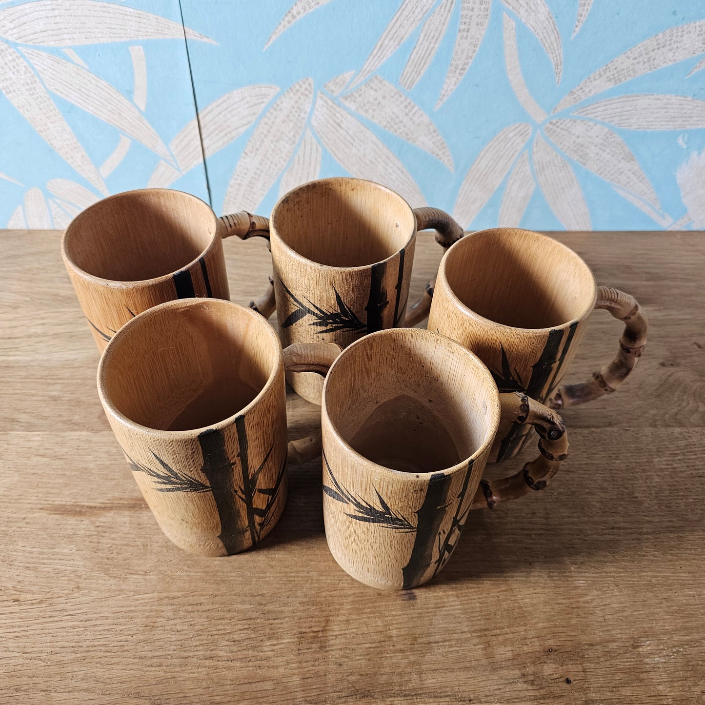 Set of five 1970s hand-painted bamboo wood tankards
