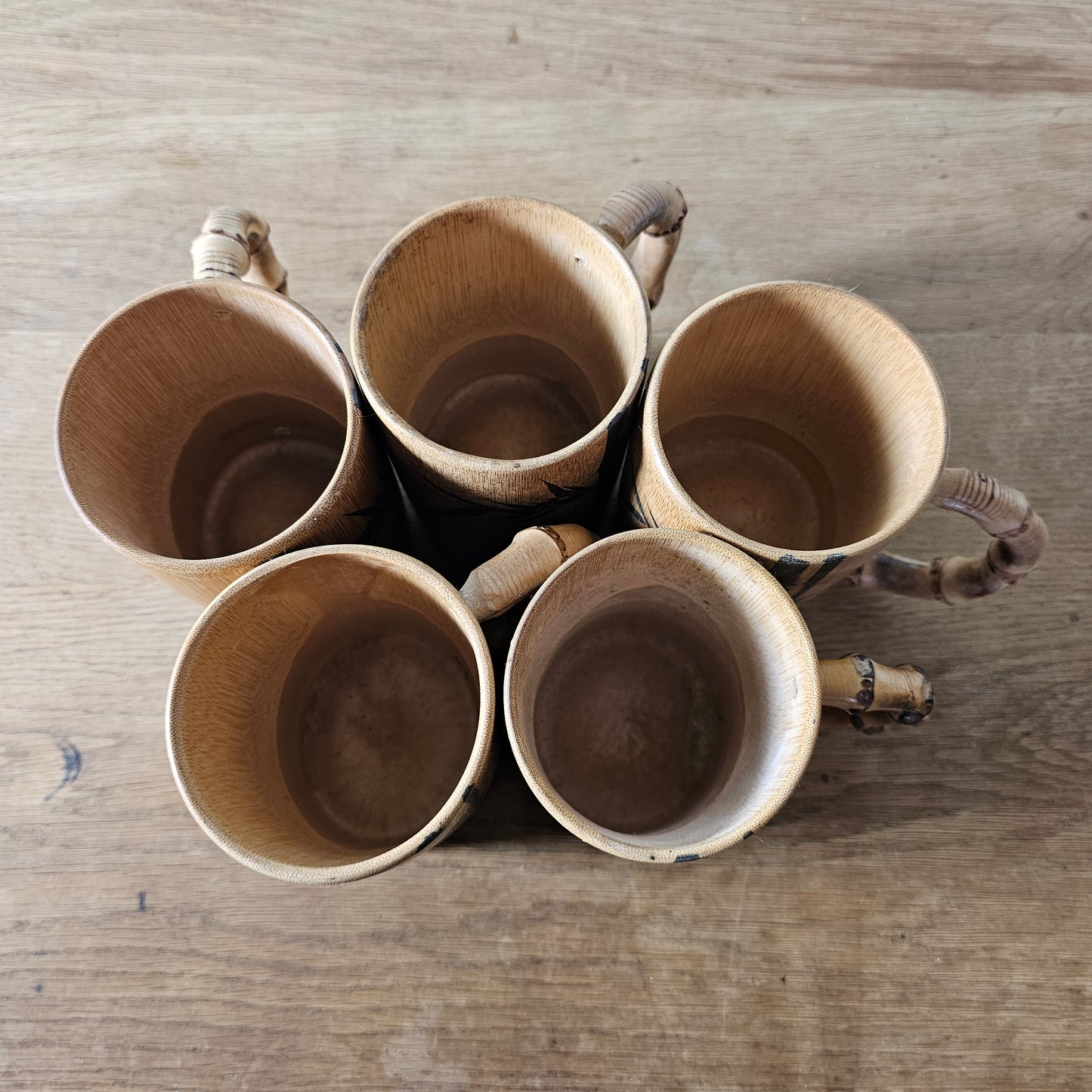 Set of five 1970s hand-painted bamboo wood tankards
