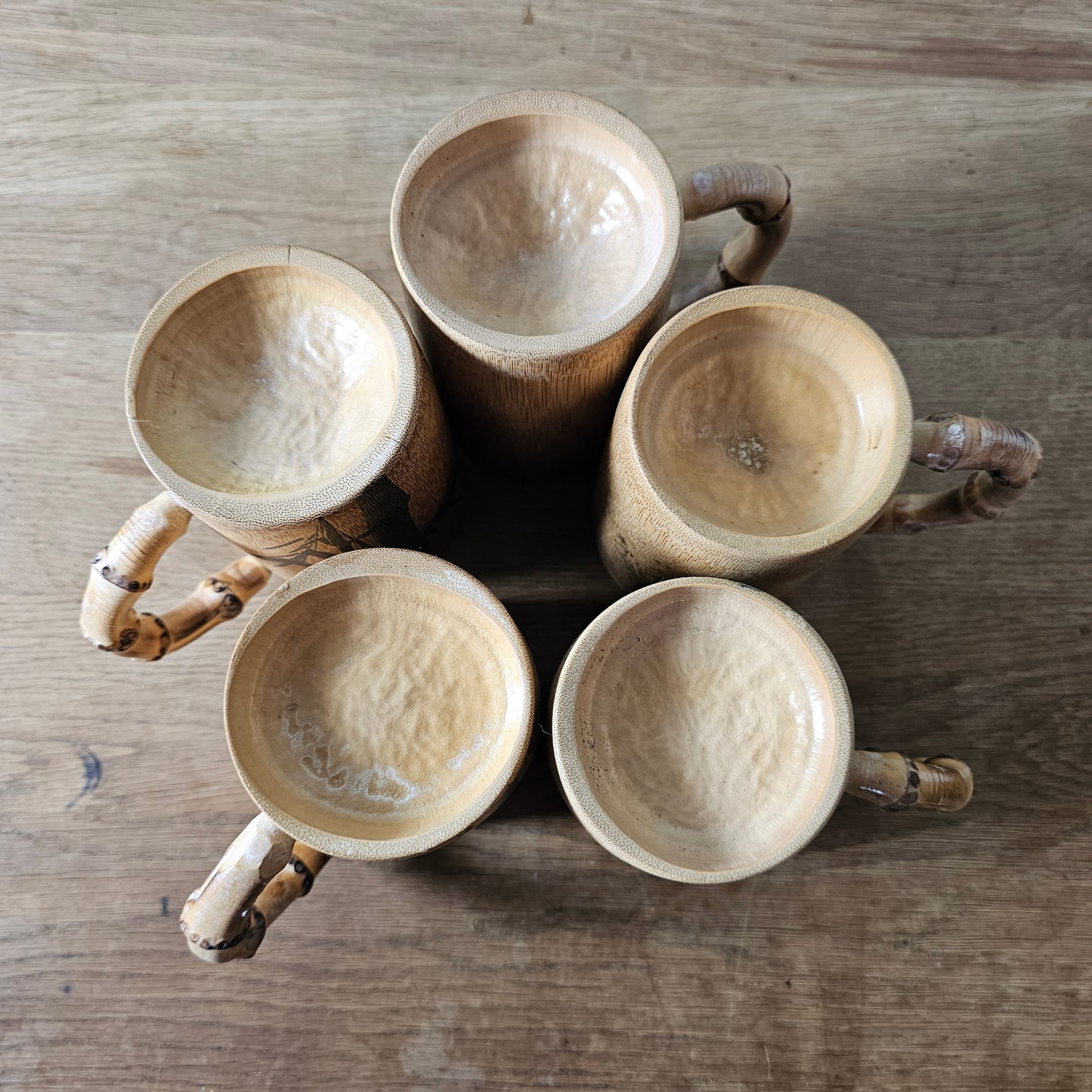 Set of five 1970s hand-painted bamboo wood tankards