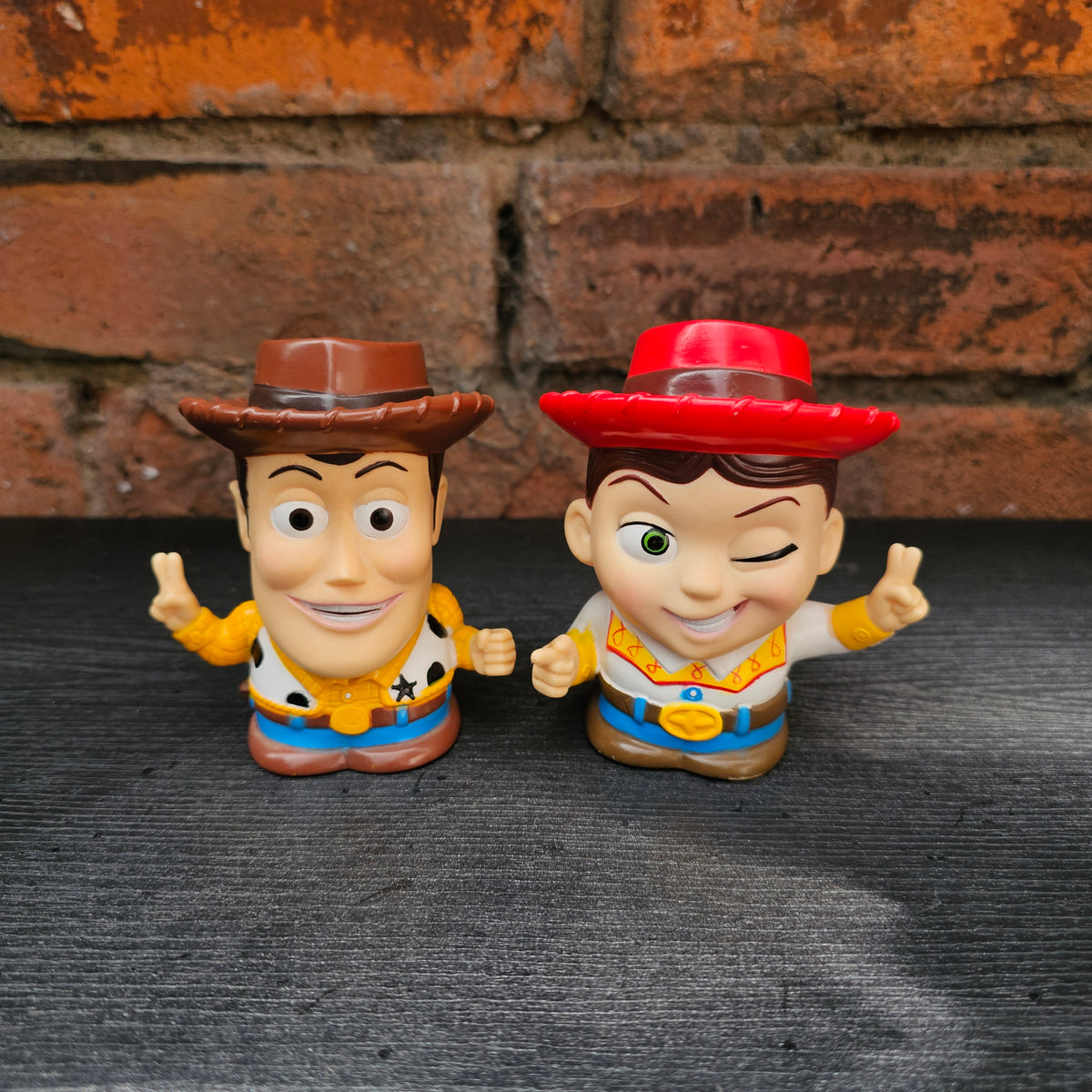 Pair of early 2000s Disney Pixar Toy Story Woody & Jessie mini money boxes
