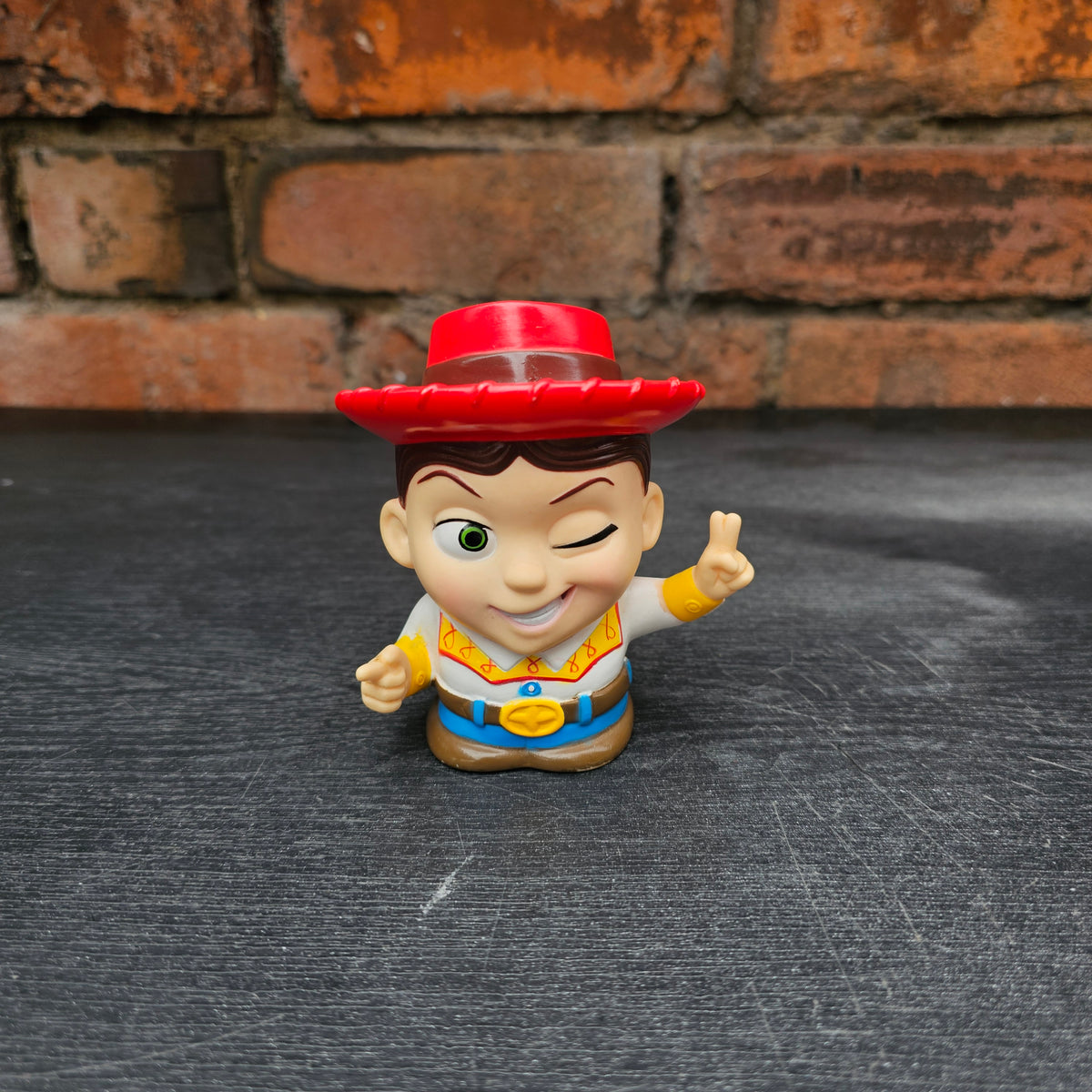 Pair of early 2000s Disney Pixar Toy Story Woody & Jessie mini money boxes