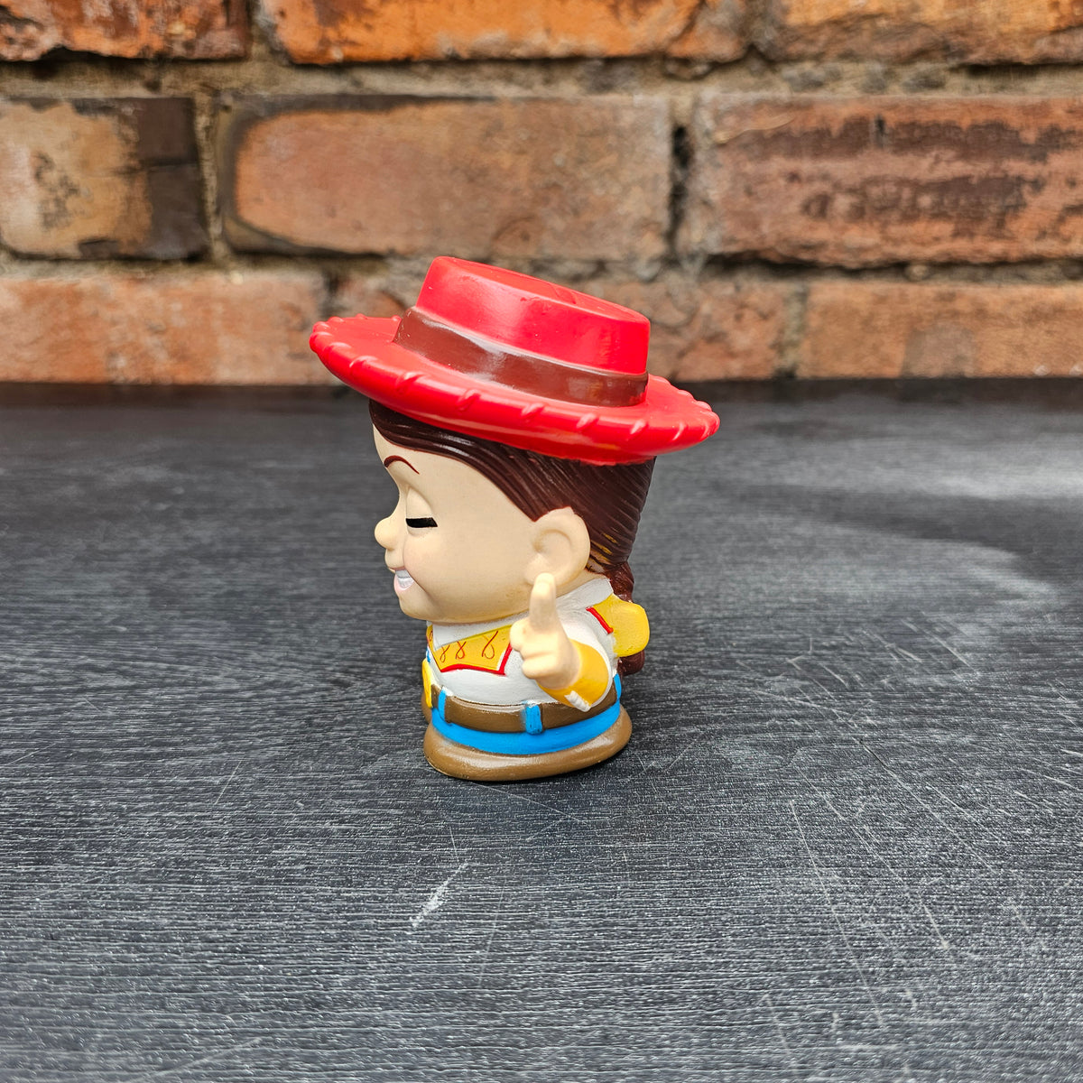 Pair of early 2000s Disney Pixar Toy Story Woody & Jessie mini money boxes