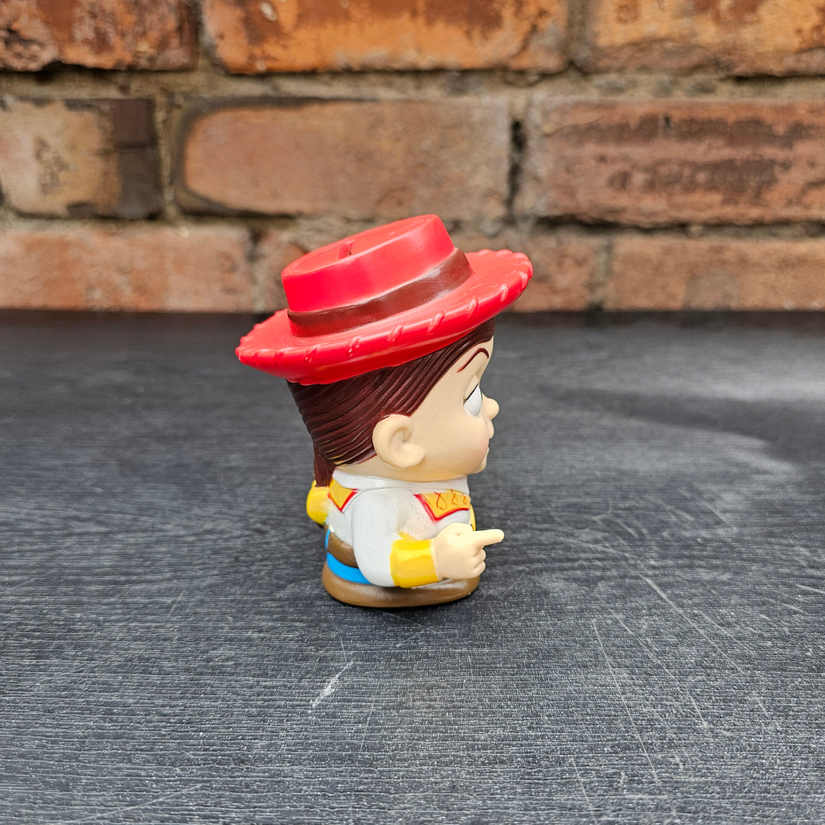 Pair of early 2000s Disney Pixar Toy Story Woody & Jessie mini money boxes