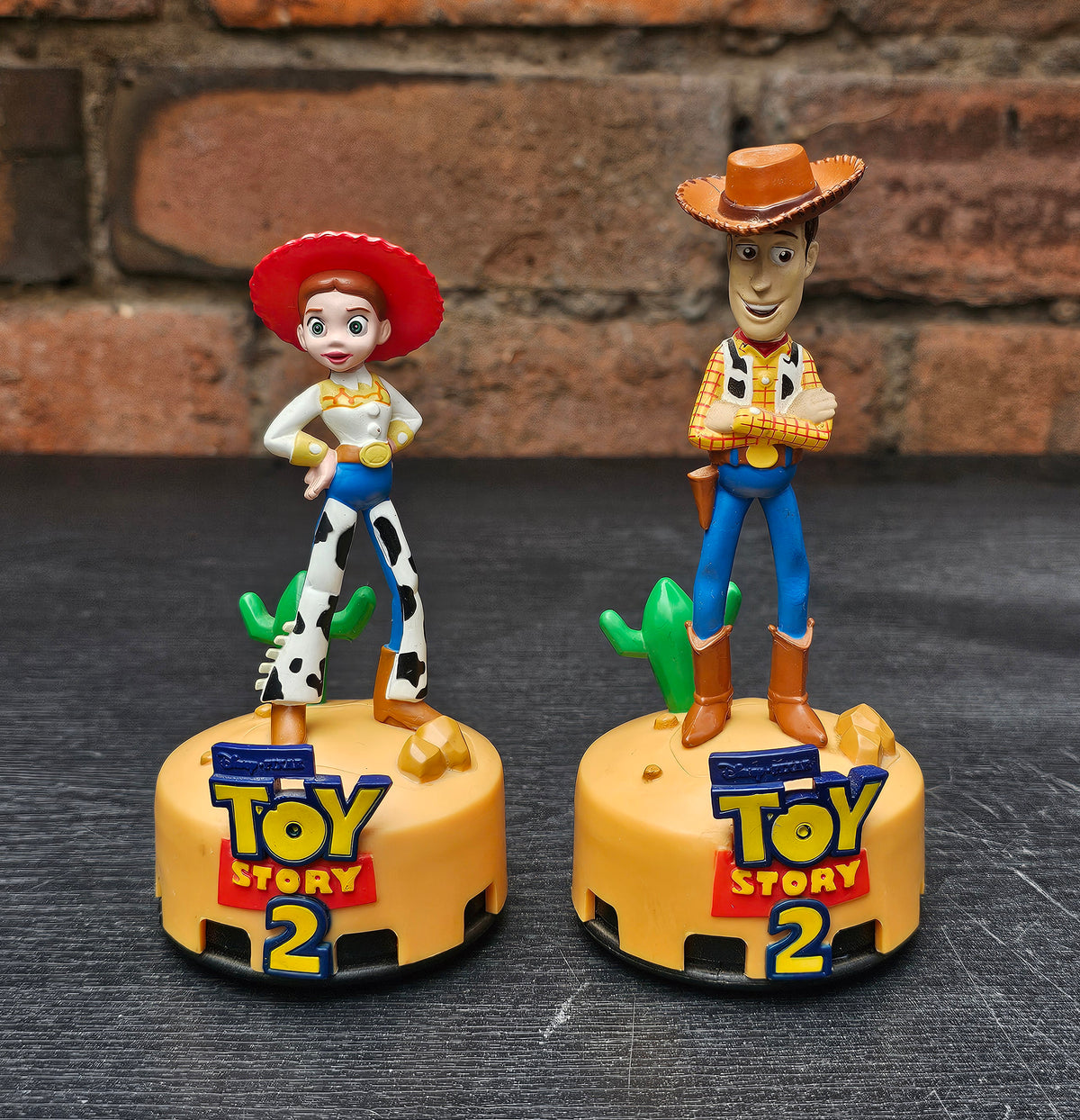 Pair of 1999 Disney Pixar Toy Story 2 Woody & Jessie car air freshener figures