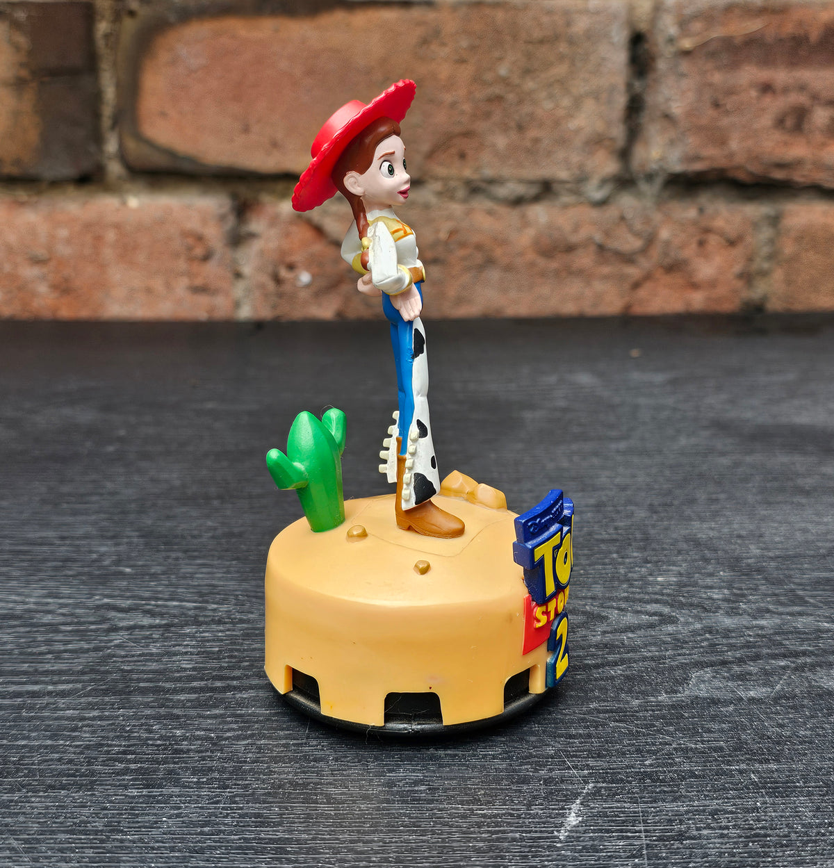 Pair of 1999 Disney Pixar Toy Story 2 Woody & Jessie car air freshener figures