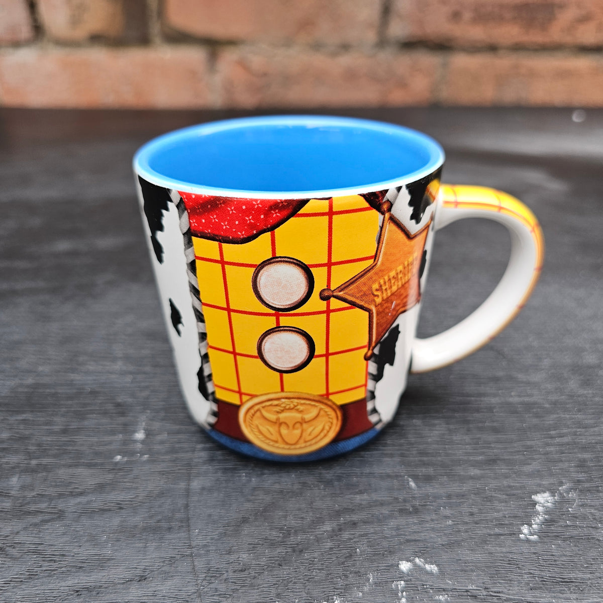 Disney Store Exclusive Toy Story Woody costume mug with blue interior