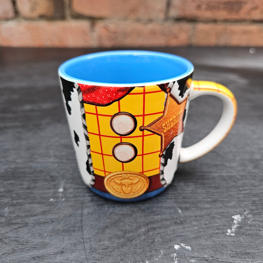 Disney Store Exclusive Toy Story Woody costume mug with blue interior