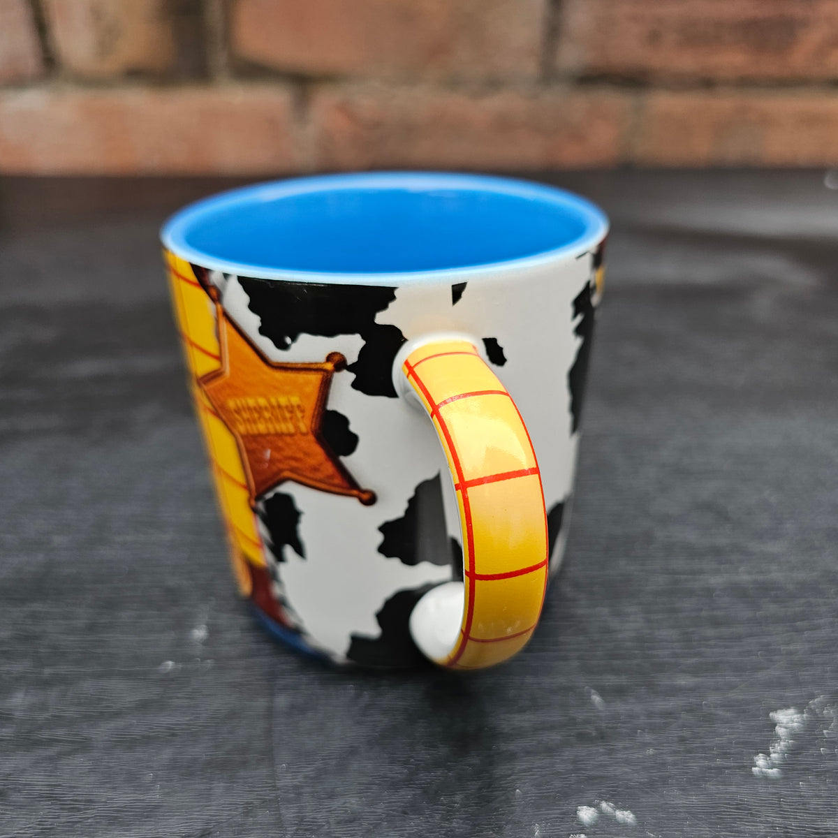 Disney Store Exclusive Toy Story Woody costume mug with blue interior