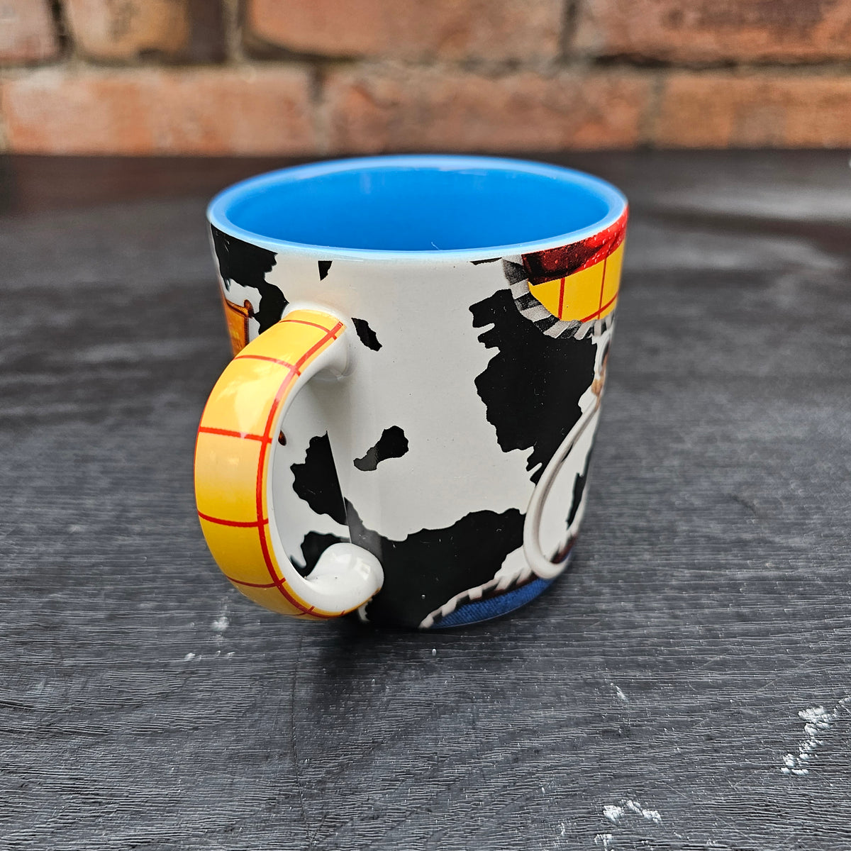 Disney Store Exclusive Toy Story Woody costume mug with blue interior