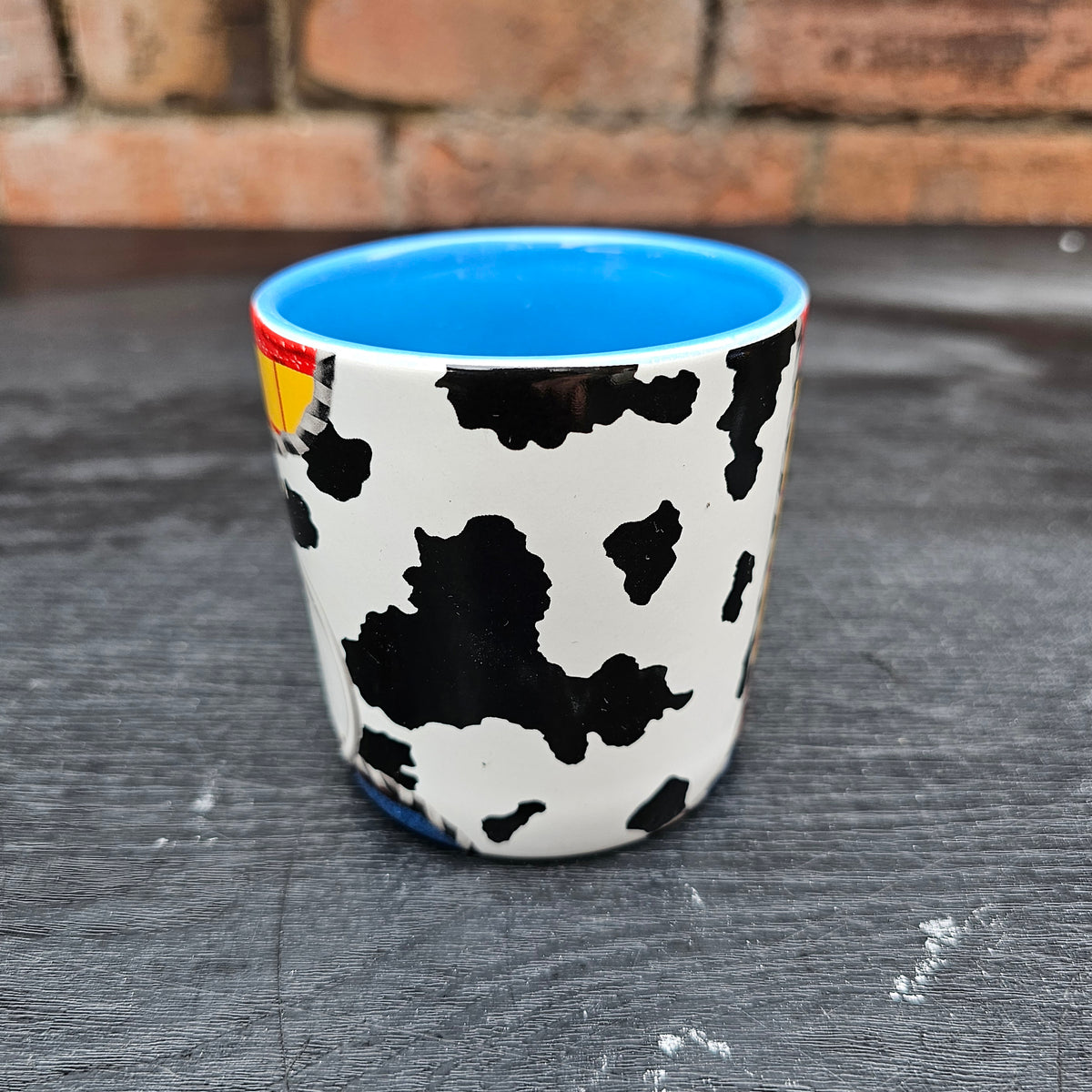 Disney Store Exclusive Toy Story Woody costume mug with blue interior