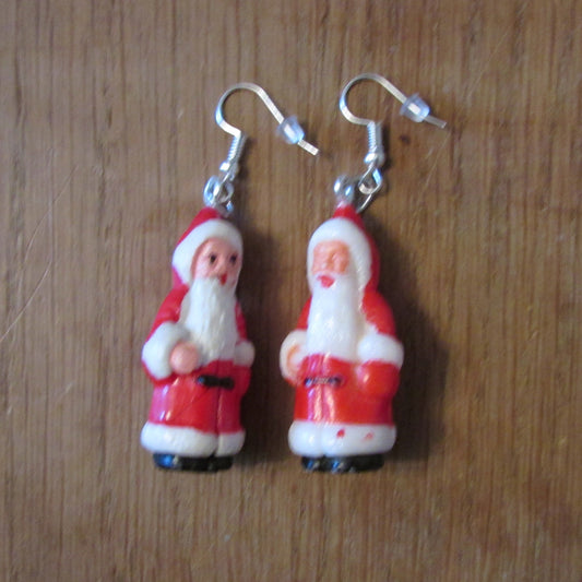 Kitsch home-made earrings made using vintage plastic Santa cake toppers
