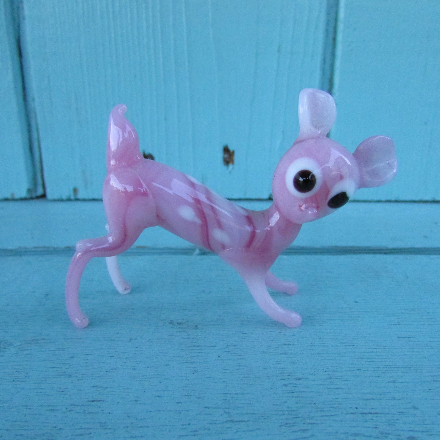 1960s streaked pink blown art glass fawn