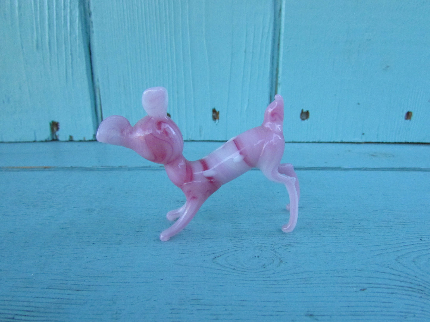 1960s streaked pink blown art glass fawn