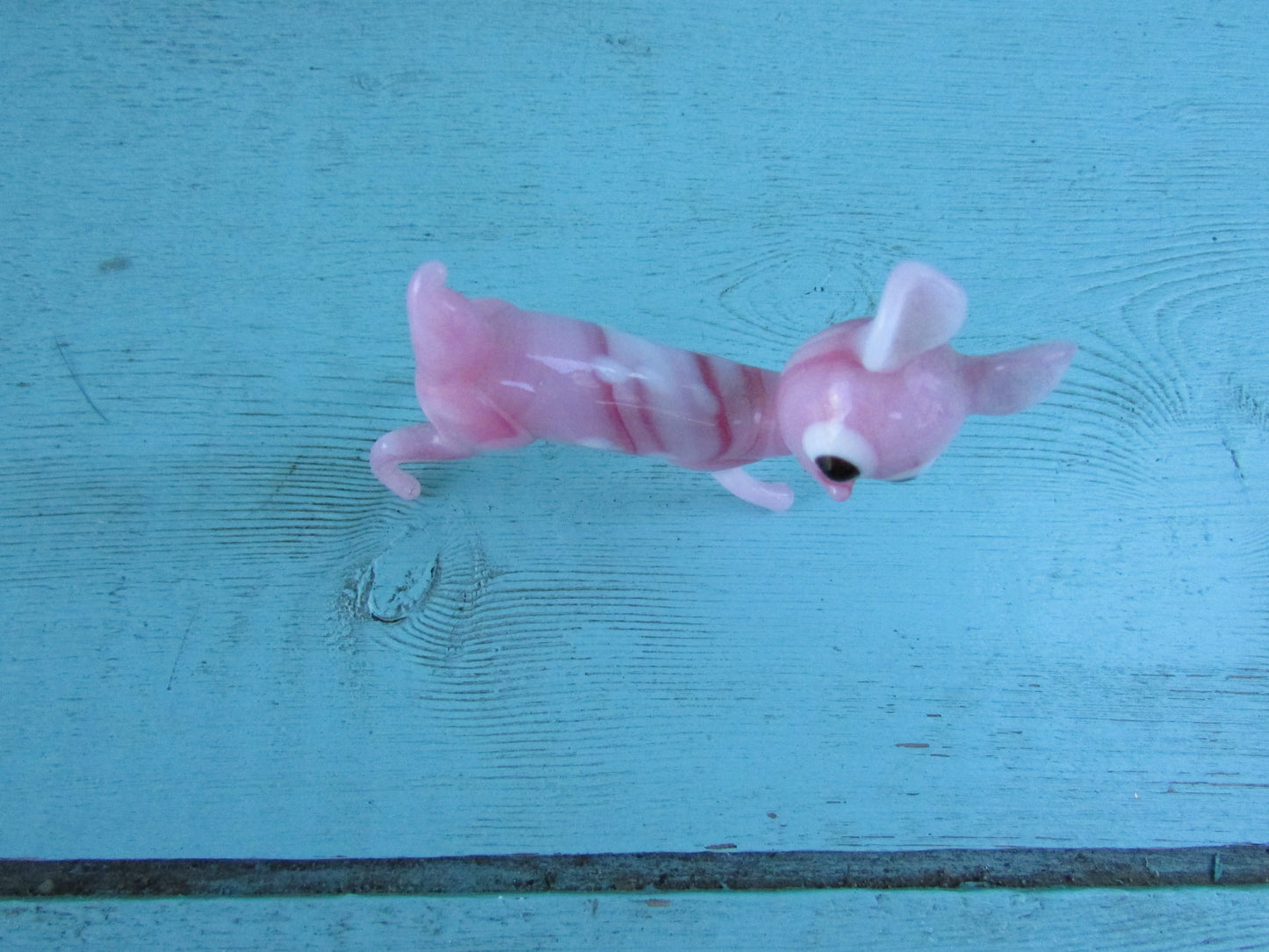 1960s streaked pink blown art glass fawn