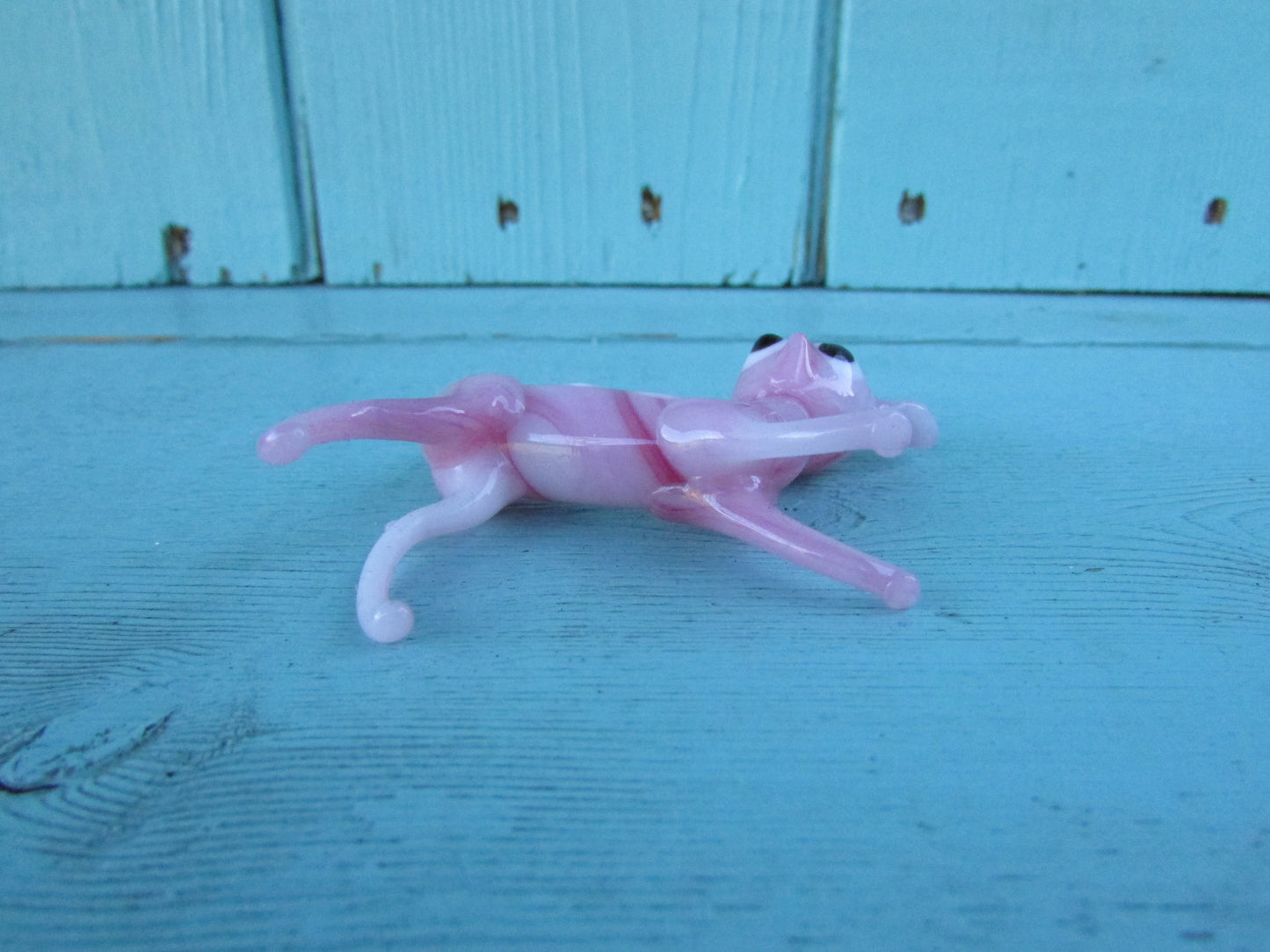 1960s streaked pink blown art glass fawn
