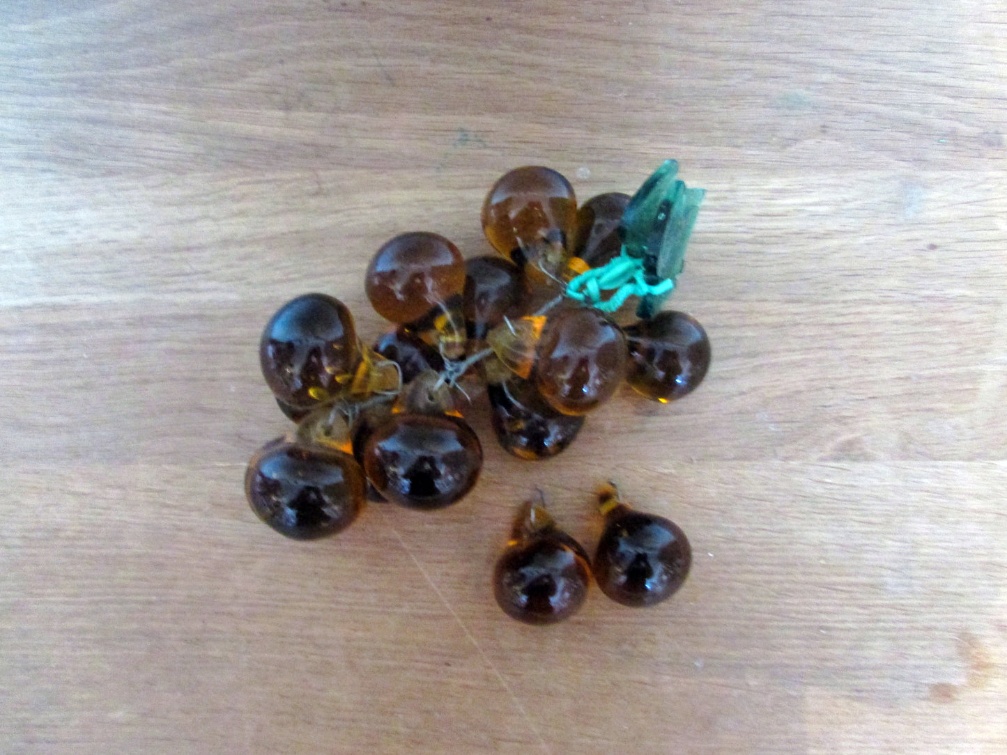 Mid-century Murano-style amber glass large grape cluster with green glass leaves