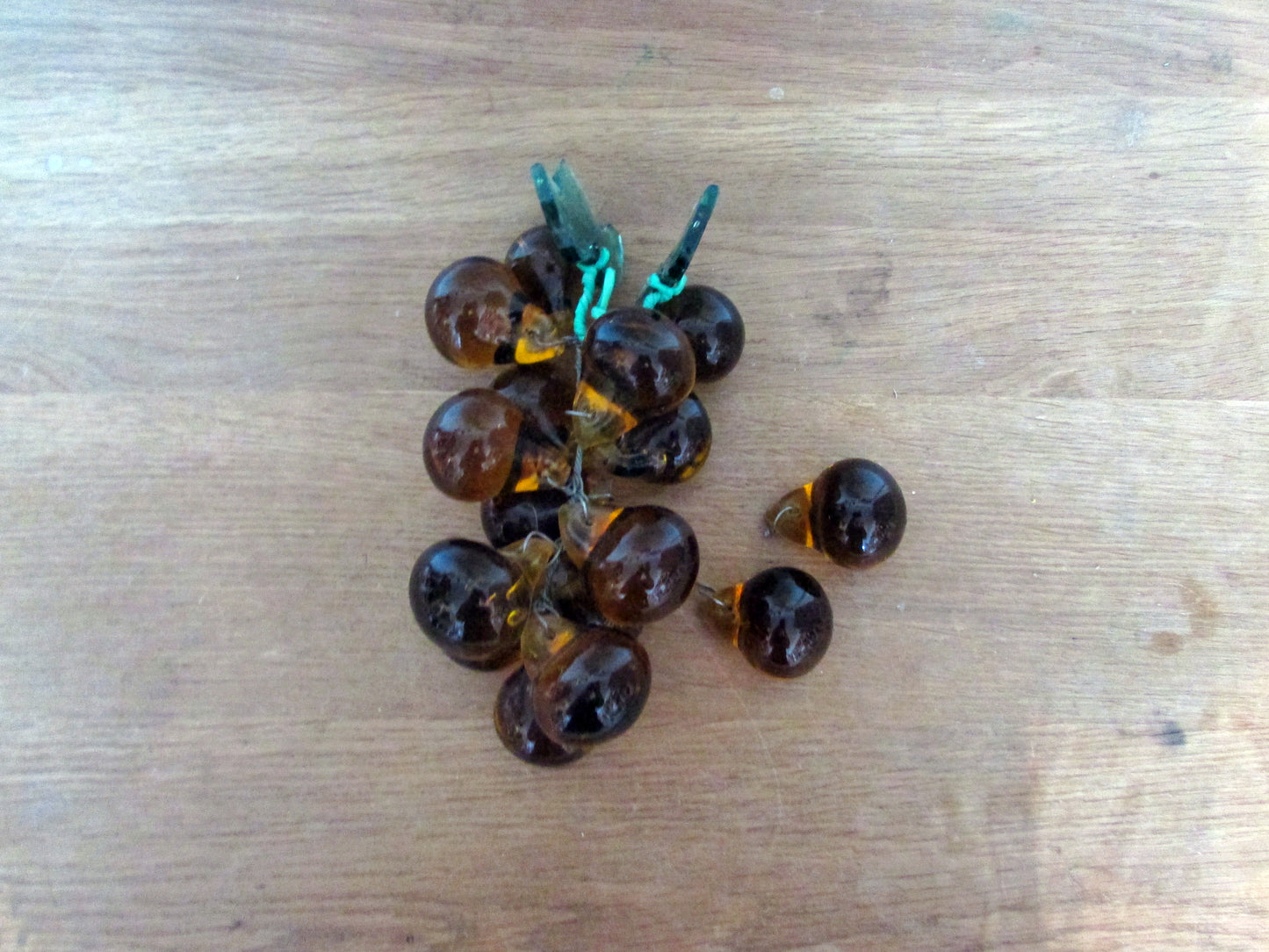 Mid-century Murano-style amber glass large grape cluster with green glass leaves