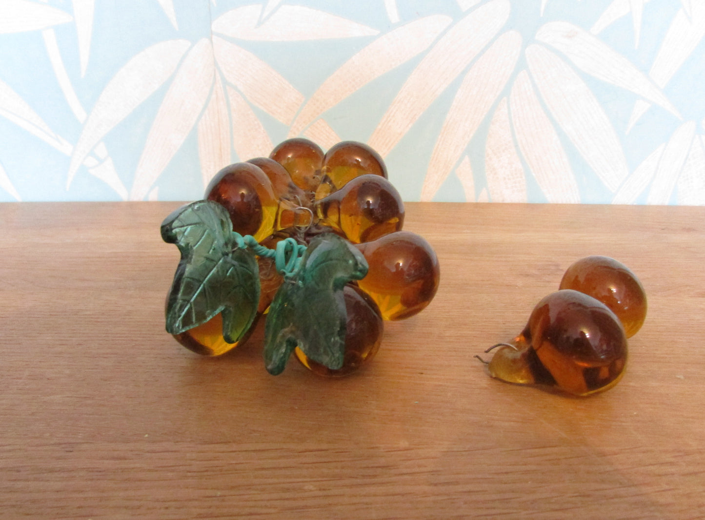 Mid-century Murano-style amber glass large grape cluster with green glass leaves