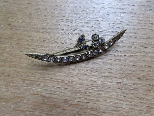 Vintage art nouveau gold-tone crescent-shaped diamanté stick pin with flower detail