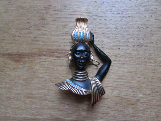 Mid-century blackamoor tribal bust brooch with turquoise seed bead accents