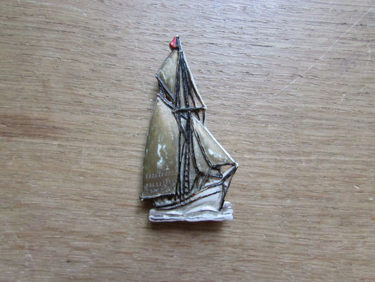 Vintage plastic tall ship brooch, stamped Made in England