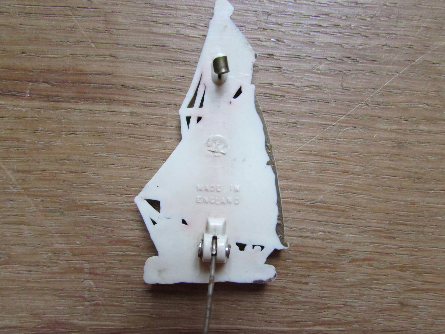 Vintage plastic tall ship brooch, stamped Made in England