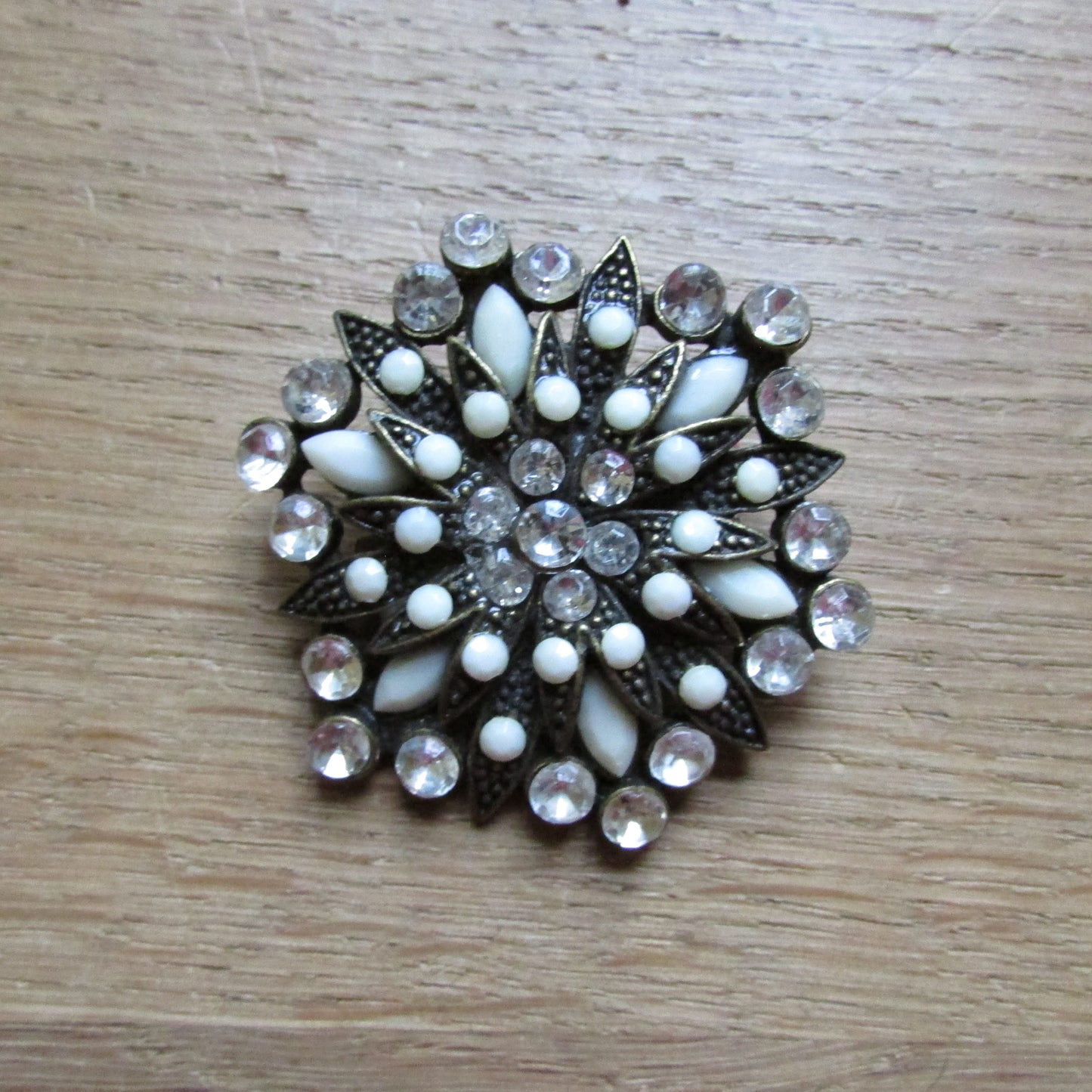 1960s/70s milk glass & rhinestone floral brooch