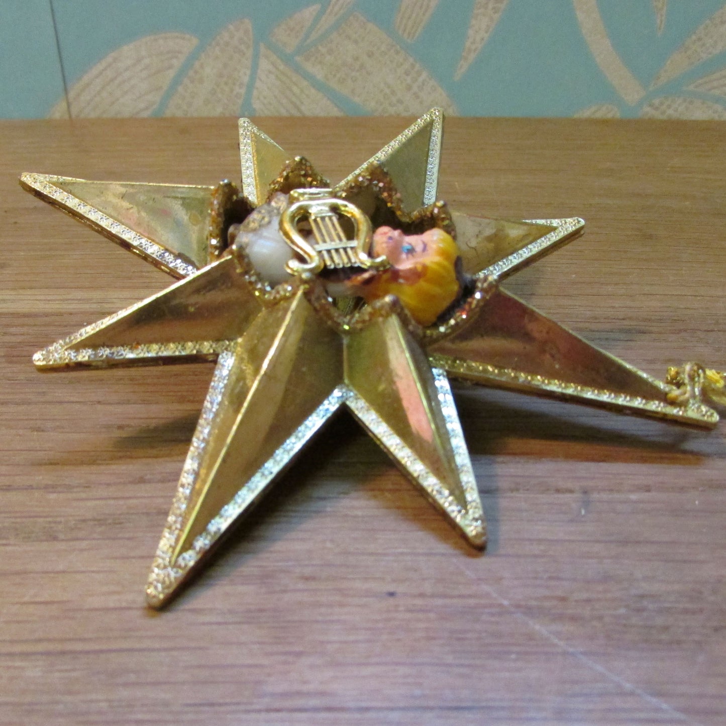 1960s/70s Jewelbrite (?) plastic gold Christmas star tree ornament with angel and harp