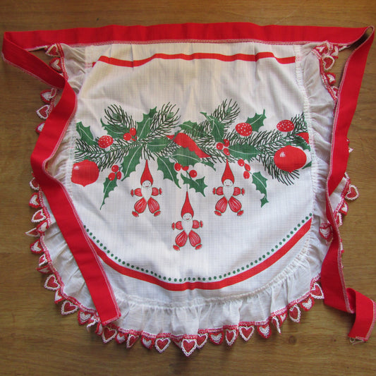 1970s kitsch Christmas-themed half apron with cute heart trim