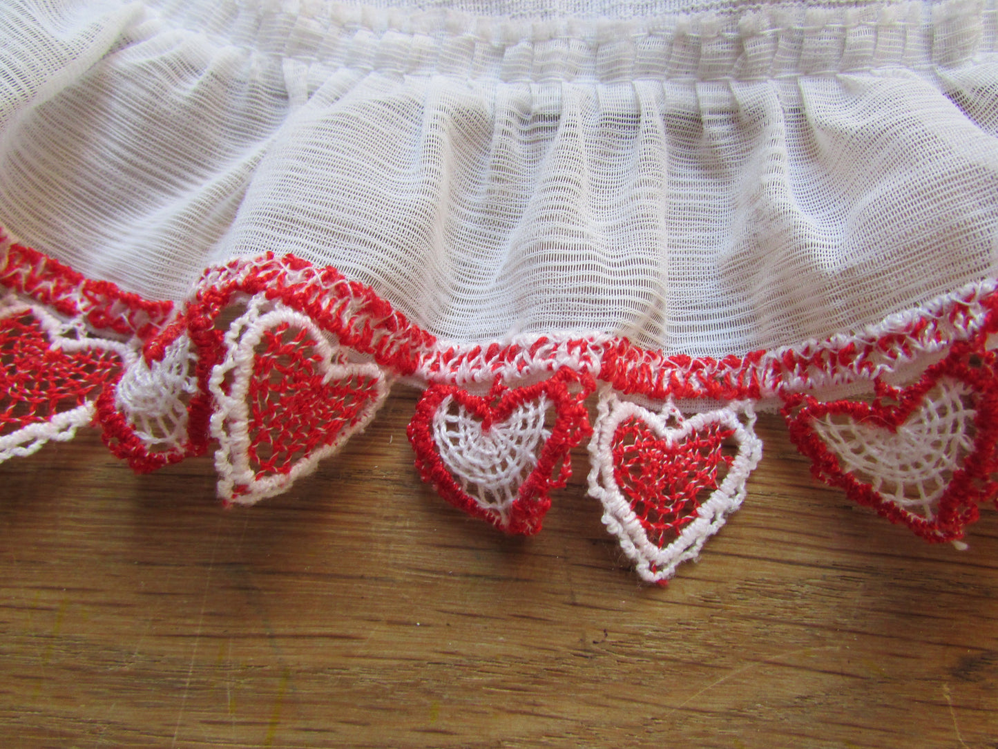 1970s kitsch Christmas-themed half apron with cute heart trim