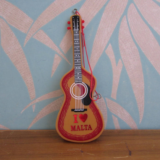 1970s/80s "I Love Malta" plastic guitar-shaped clothes/hair brush