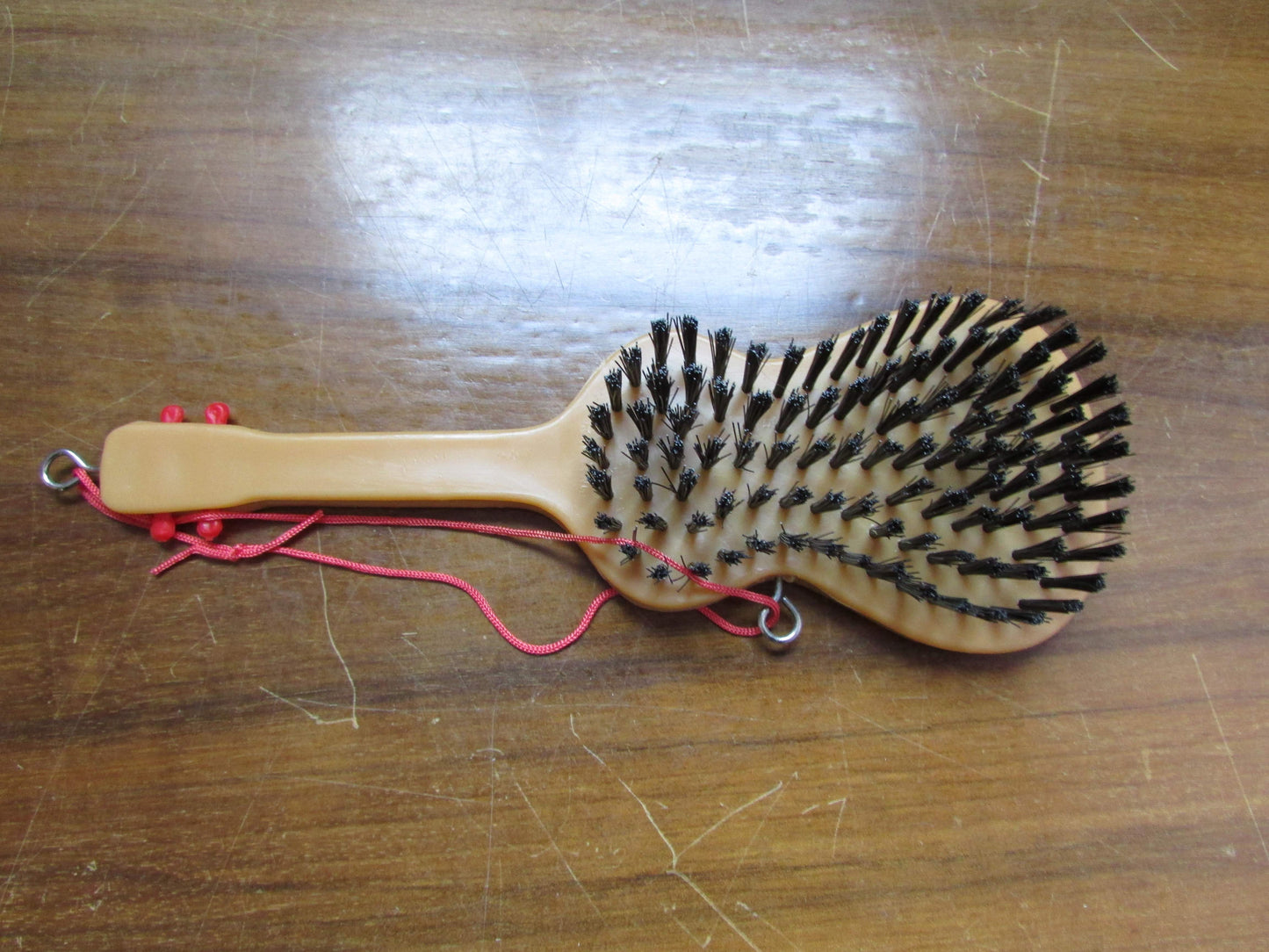 1970s/80s "I Love Malta" plastic guitar-shaped clothes/hair brush